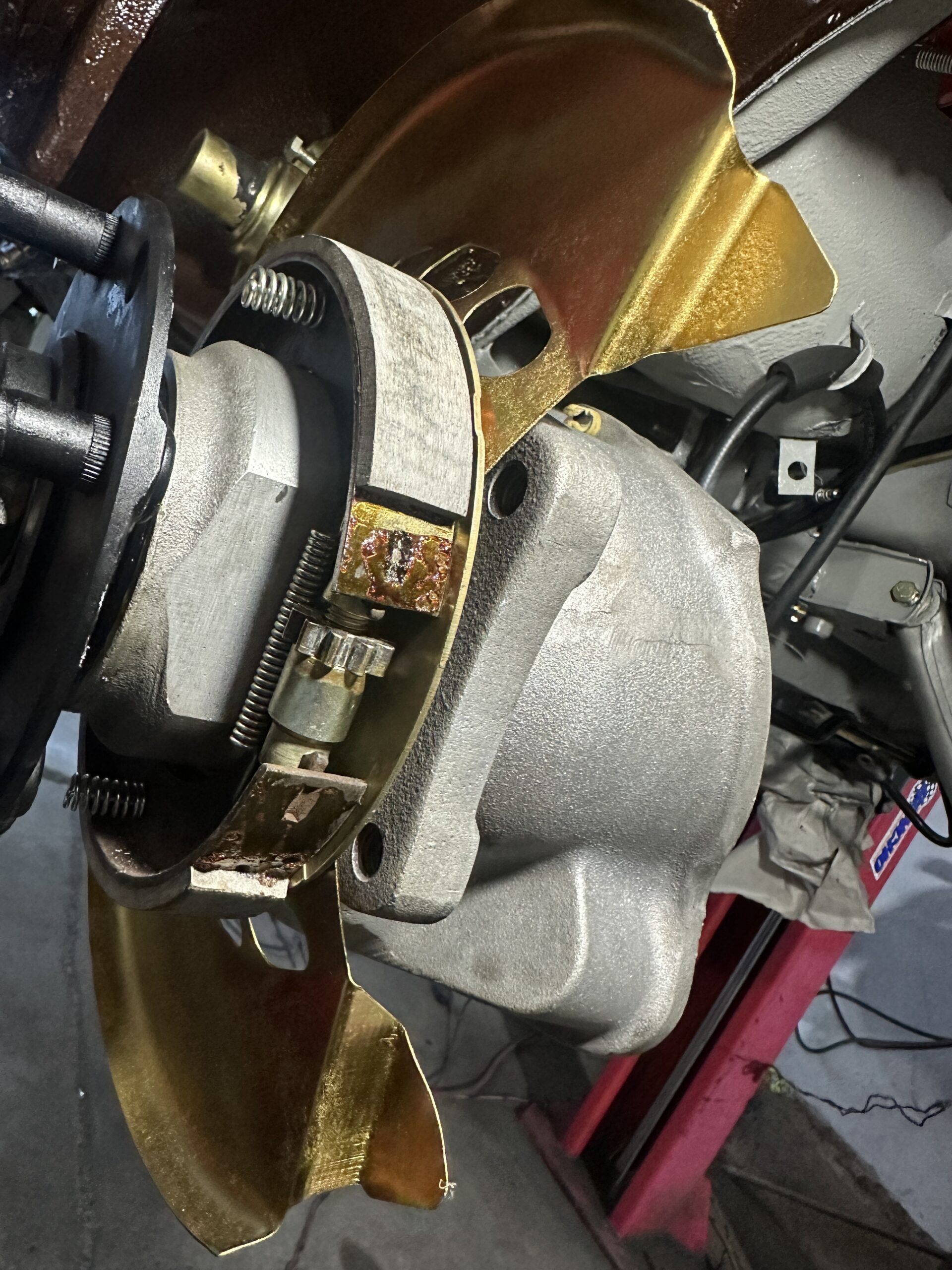 the new handbrake shoes that were installed as part of the restoration process. These new components ensure that the handbrake system operates smoothly, providing reliable stopping power when needed. Replacing the handbrake shoes is crucial for maintaining the Porsche 930's safety and functionality, ensuring long-lasting performance."